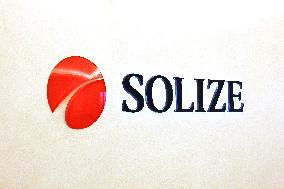 SOLIZE exterior, logo and signage